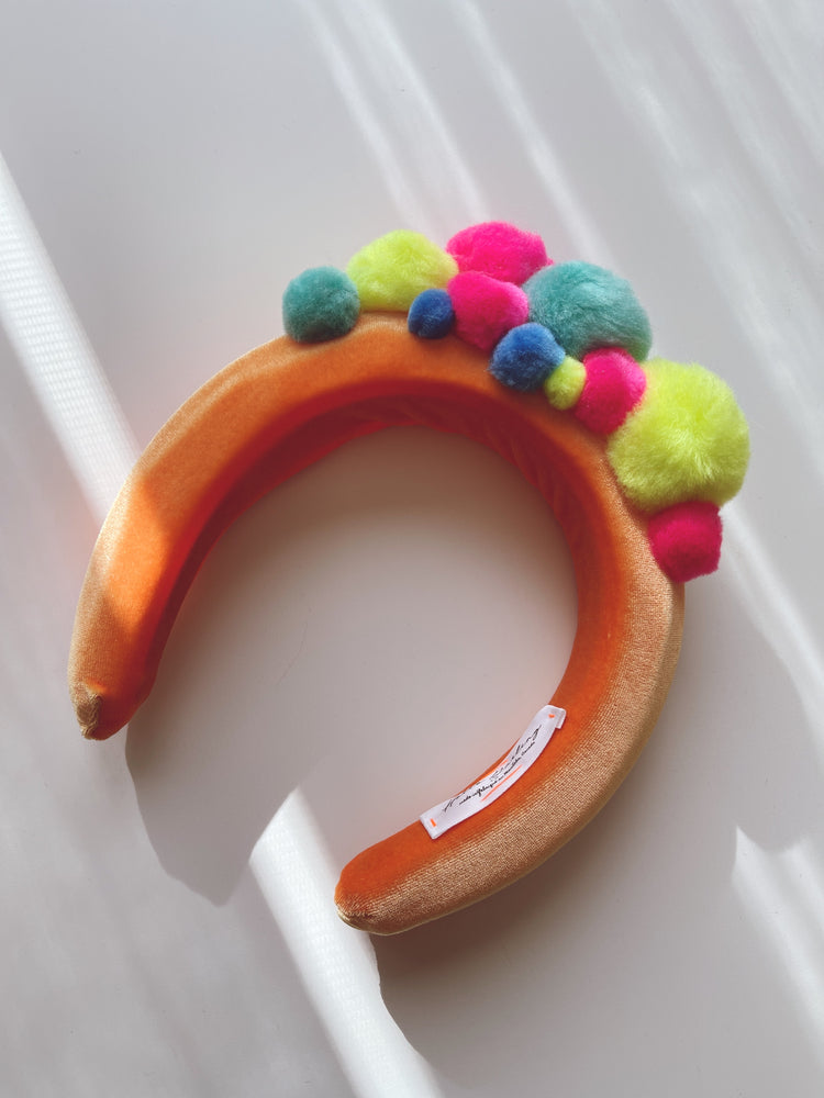 
            
                Load image into Gallery viewer, Creamsicle Fiesta Pom Party Headband
            
        
